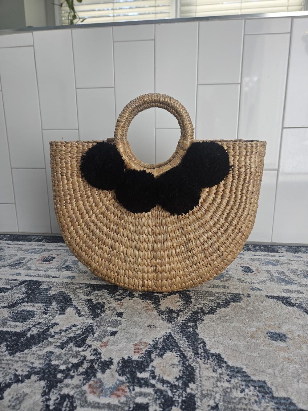 Camryn Pom-Pom Seagrass Top Handle Bag